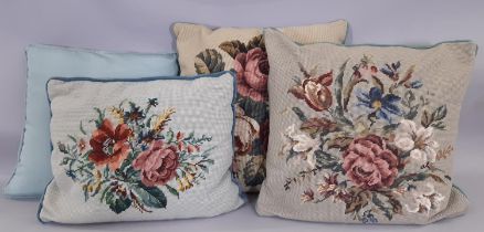 Three needlepoint cushions in floral design and one other. Largest is 46x46cm (4)