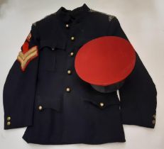 Early to mid 20th century military jacket in navy blue wool with 2 chevron sleeve stripes for rank