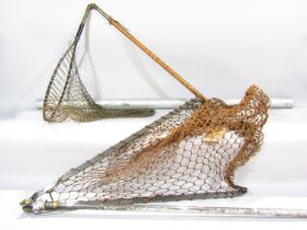 A Hardy Bros sea trout landing net, a vintage bamboo landing net and a metal tube rod protector.