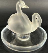 A Lalique Crystal double swan pin tray, engraved 'Lalique France' to base, 10cm diameter x 9.5cm