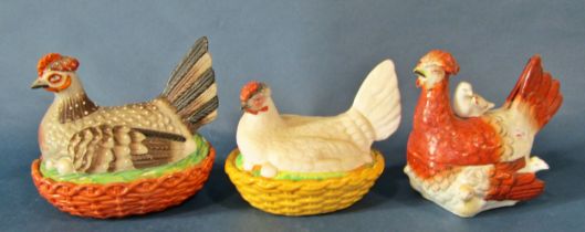 Four 19th century and later porcelain / ceramic storage jars in the form of seated hens together