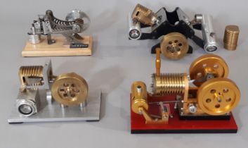 Four kit built educational heat/ vacuum driven model engines including a Stirling generator