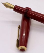 Four vintage Parker fountain pens, a junior, junior duofold, a duofold and senior duofold, various