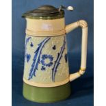 A James Macintyre & Co Faience tankard of tapering form with applied pewter thumb-paw cover, mark to