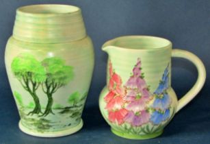 10 various Radford pottery pieces, decorated with floral motifs, a jug decorated with a stylised