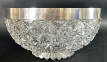 A Victorian cut glass fruit bowl with a silver rim, hallmarked Birmingham 1891 maker John Grinsell &