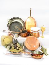 A selection of 19th century copper kitchenalia including four flat based twin handled pans