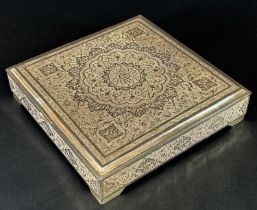 A richly engraved and incised Iranian silver box with a dedication to the inside of the lid, stamped