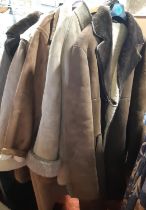 3 sheepskin coats comprising a pale ladies jacket size 14 with toggle fastening, a dark brown men'