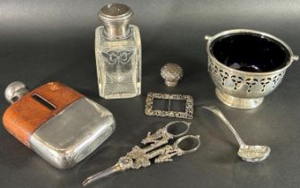 A silver lot of mixed pieces including a sugar bowl, hip flask, etc