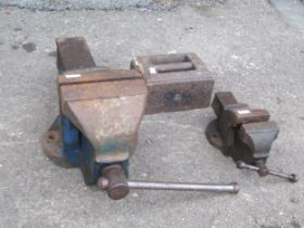 Two bench vices together with cast iron weight (3)