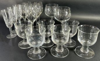 A mixed selection of wine glasses, tumblers, tankards, including four Waterford wine glasses.