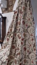 One pair curtains and one single curtain in heavyweight woven fabric on neutral ground, patterned
