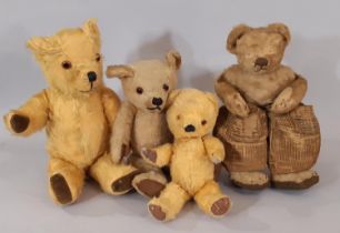 4 vintage teddy bears, the larger 2 having glass eyes and stitched nose and mouth. Height range 27-