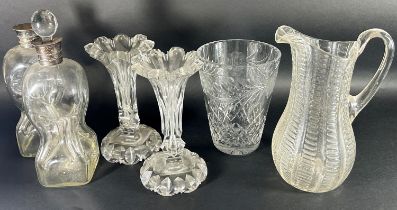 A large mixed quantity of clear-cut glassware to include six Baccarat champagne glasses, two