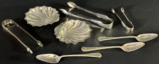 A pair of silver scallop shell butter dishes, Sheffield 1917, makers Atkin Brothers, together with