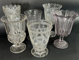 Eight Victorian and Edwardian cut glass celery vases, of varying shapes and sizes.