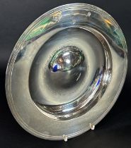 A silver presentation dish with a dedication to the base, London 1982, maker William Comyns & Sons