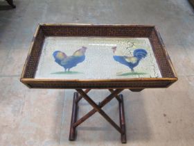 A decorative butler’s type tray, the deep top painted in oils internally with a stylised hen and
