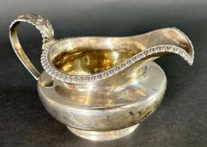 A George III silver cream jug, London, 1809 by Richard Pearce & George Burrows, with an acanthus