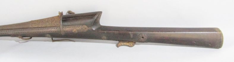 An 18th century Indian matchlock musket/rifle, 170 cm long.