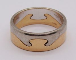 Two Georg Jensen 'Fusion' puzzle rings in 18ct white / yellow gold, each stamped 'GEORG JENSEN 750