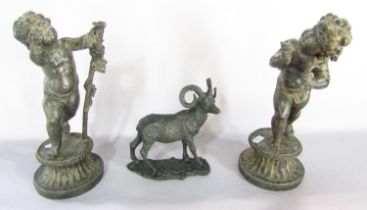A bronze mountain goat, 17cm high and two spelter wingless putti raised on reeded socle bases,