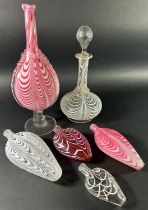 Four Nailsea glass flasks, Nailsea glass vase, decanter and paperweight c.late 1900