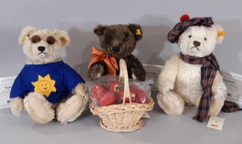 Three teddy bears from the Steiff Four Seasons' range including 'Scrumpy' with apples unopened in