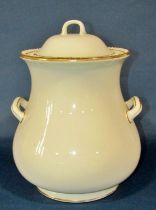 A large late 19th century Copeland porcelain twin handled storage jar, with gilt borders and