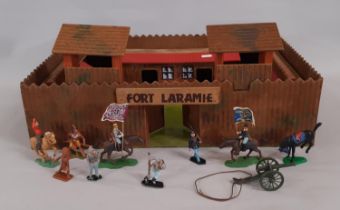 Vintage wooden 'Fort Laramie' 52x37cm with an unsorted collection of plastic Wild West figures and
