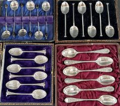 A cased set of six Goldsmiths & Silversmiths coffee spoons with shell bowls, circa 1890s and three