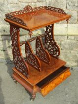 A good quality Victorian burr walnut whatnot canterbury, with scrolling acanthus pierced sides,