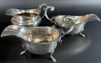 A pair of Georgian style sauce boats, Birmingham 1934, maker S Blankensee & Son Ltd and a silver
