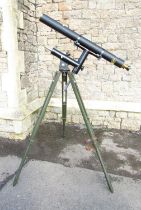 A Broadhurst Clarkson & Co black laminate and brass telescope with a wooden adjustable tripod, and