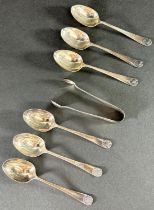 A box of six silver teaspoons and a sugar tong, Sheffield 1915, maker James Deacon & Sons, 2.7 oz