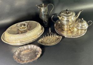 A mixed selection of silver plated tableware, including a drinks tray, tureen with cover, a coffee