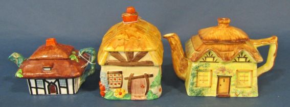 A group of cottageware porcelain items to include teapots, butter dishes, etc, also together with