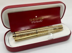 A collection of fountain pens to include Sheaffer three pen set, Prelude design, to include two