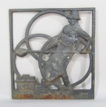 A cast iron Lister Foundry sign dated 1867 - 2001, of a foundry man pouring molten metal into a