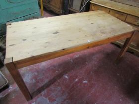 A pale pine kitchen table, 76cm high, 167 x 84cm