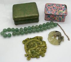 A small collection of Chinese items to include a hardstone / jadeite bi disk carved with a dragon,