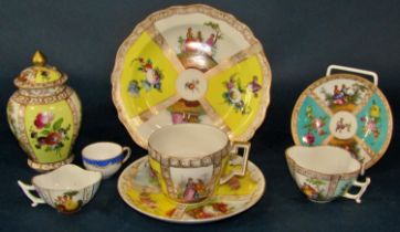 A group of decorative continental ceramics to include a small vase and cover, a Dresden cabinet