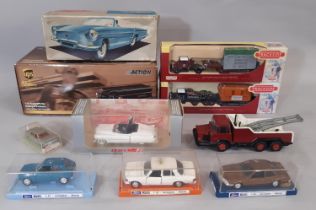 Collection of model vehicles including three 1:43 cars by Schuco, a vintage clockwork Floride car by