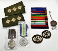 Box of military badges, medals and ribbons, coinage, military buttons, together with bronze