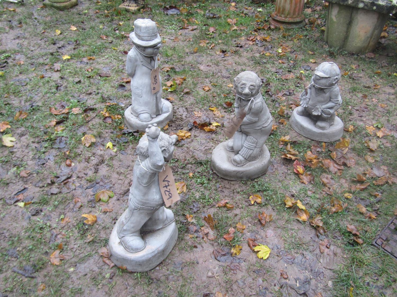Collection of four novelty cast composition stone statues of cricketers, batsman, bowler, wicket