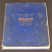 The Strand stamp album containing a worldwide collection of stamps mainly George VI and later
