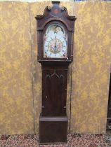 An early 19th century longcase clock, the trunk with gothic door and reeded column supports, the