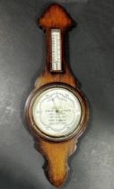 A 1930s Oak cased aneroid The Wilson Forecast barometer