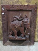 Indonesian carved Teakwood panel of an elephant and three riders